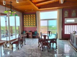 Spacious dining area with large windows and beautiful view