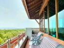 Balcony with outdoor seating and a scenic view