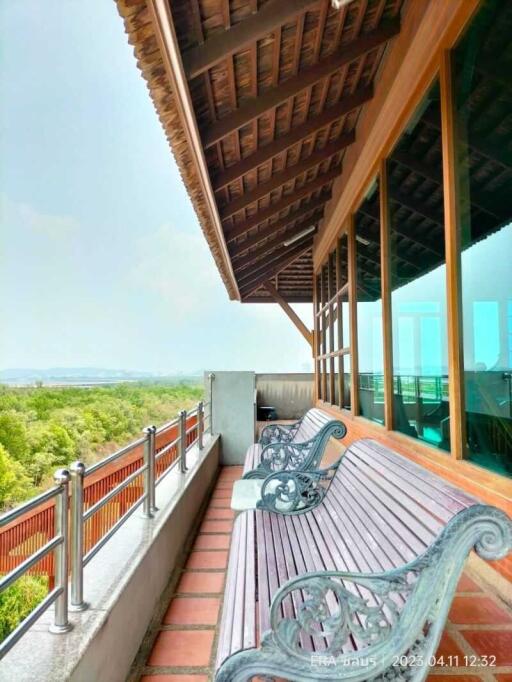 Balcony with outdoor seating and a scenic view