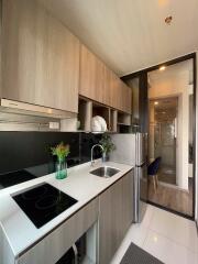 Modern kitchen with sleek cabinetry and appliances