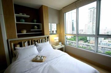 Modern bedroom with city view