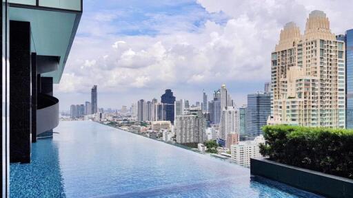 High-rise city view with infinity pool