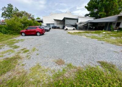 Outdoor parking area with multiple parked cars