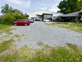 Outdoor parking area with multiple parked cars