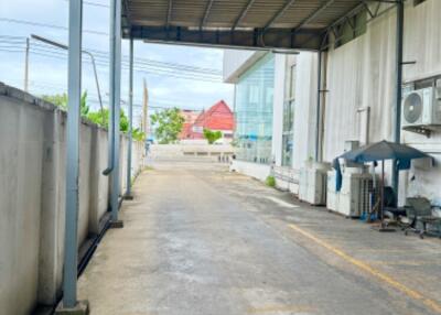 Covered outdoor area next to the building