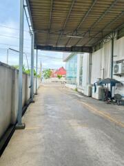 Covered outdoor area next to the building