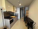 Compact modern kitchen with dining area