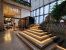 Modern atrium with staircase and large windows