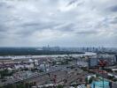 Aerial view of a cityscape with cloudy sky