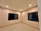 Bedroom with two windows and recessed lighting