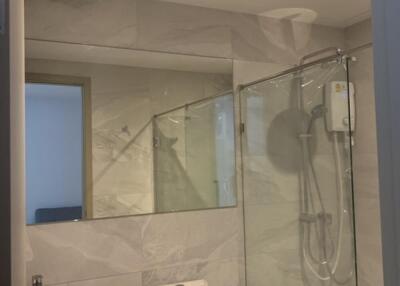 Modern bathroom with glass shower enclosure