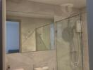 Modern bathroom with glass shower enclosure