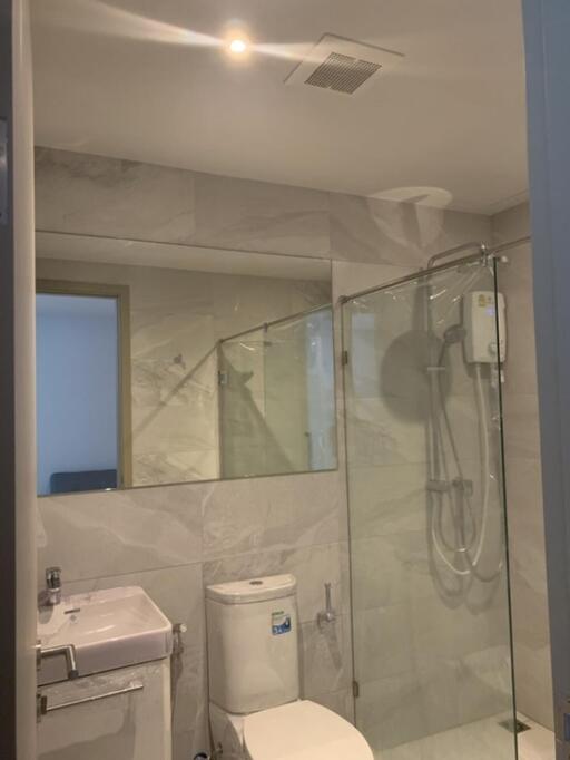 Modern bathroom with glass shower enclosure