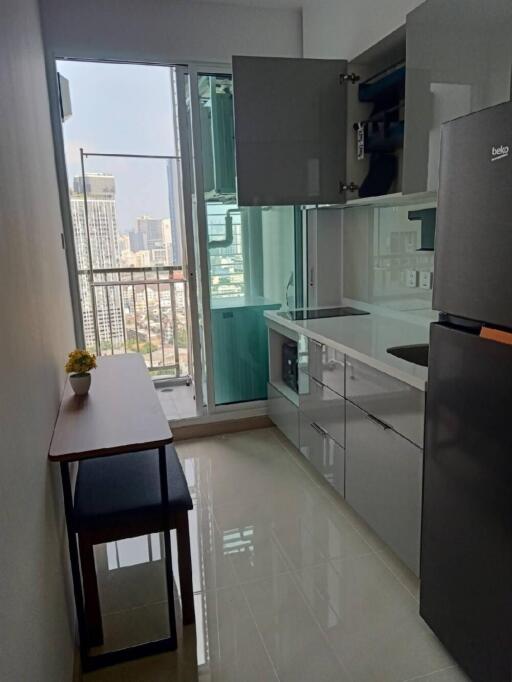 Modern kitchen with high-rise city view