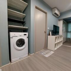 Laundry area integrated with living space