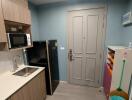 Compact kitchen space with essential amenities