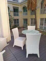 Outdoor balcony with seating area