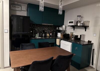 Modern kitchen with dining table