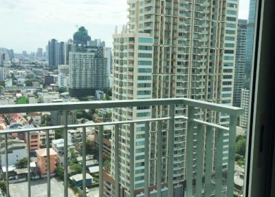 City view from balcony with high-rise buildings