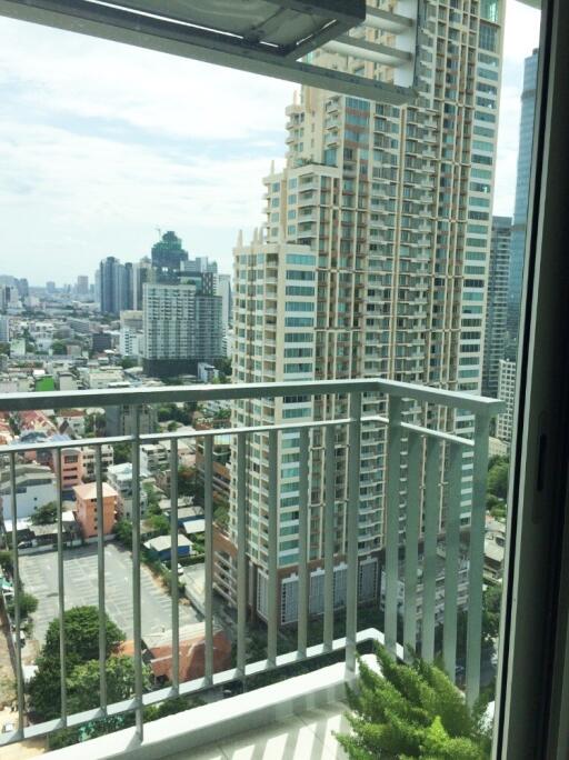 City view from balcony with high-rise buildings