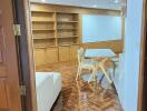 Living room with wooden furniture and built-in shelves