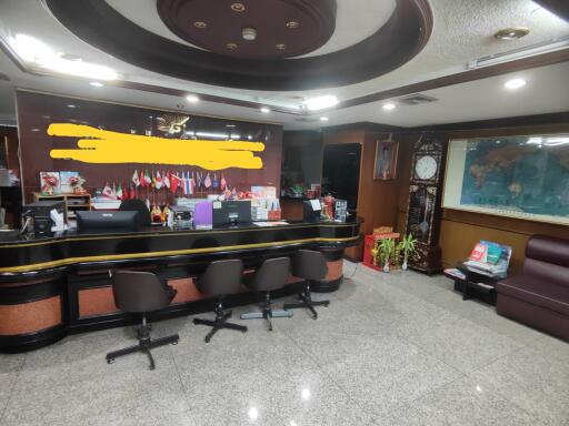 Reception area with office chairs and counter