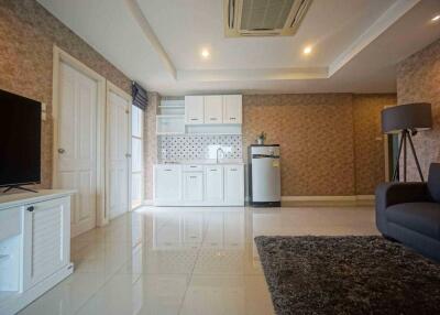 Spacious and modern living area with kitchen corner