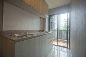 Modern kitchen with balcony