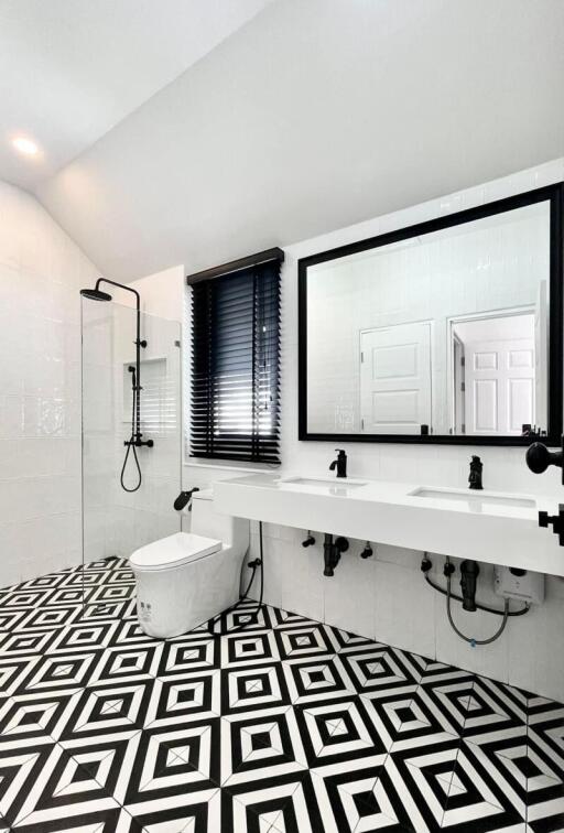 Modern bathroom with geometric patterned floor