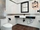 Modern bathroom with wall-mounted sink and stylish lighting