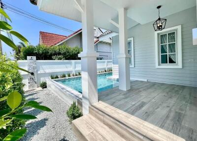 Outdoor area with pool and patio