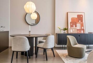 Modern dining area with stylish furniture and decor