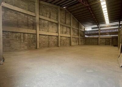 Spacious industrial warehouse with high ceilings and large open floor space