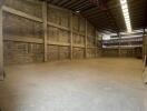 Spacious industrial warehouse with high ceilings and large open floor space