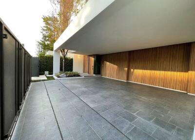 Modern house exterior with covered carport