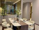 Modern dining area with a contemporary table setup and stylish chairs