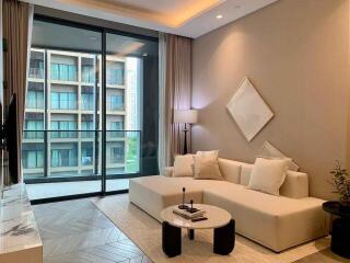 Modern living room with large window and balcony view