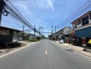 View of a street with buildings and wires