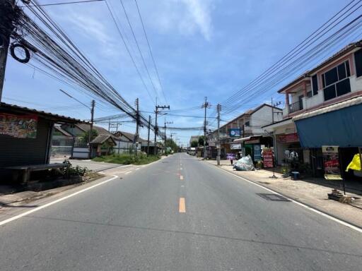 View of a street with buildings and wires