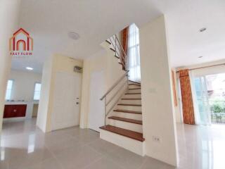 Modern and bright main living area with staircase