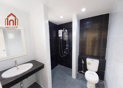 Modern bathroom with shower and toilet