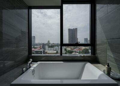 Modern bathroom with a city view