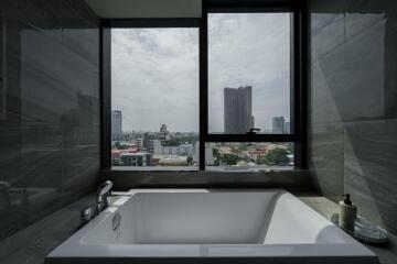 Modern bathroom with a city view