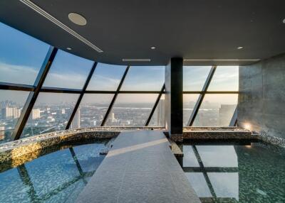 Indoor pool with city view