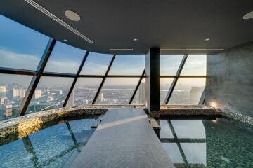 Indoor pool with city view