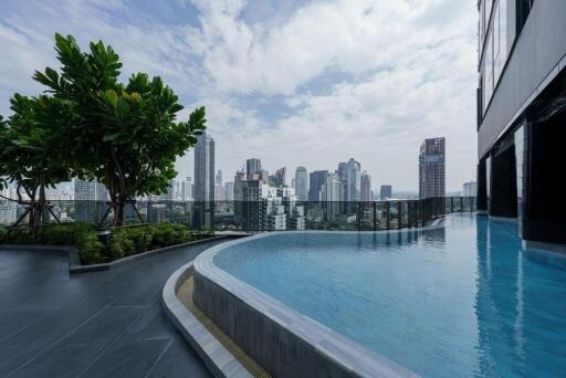 Rooftop infinity pool with city skyline view