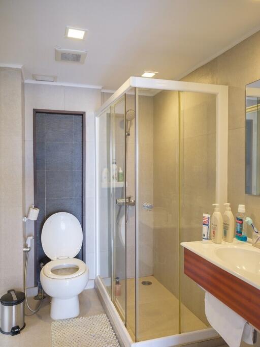 Modern bathroom with shower enclosure and toilet