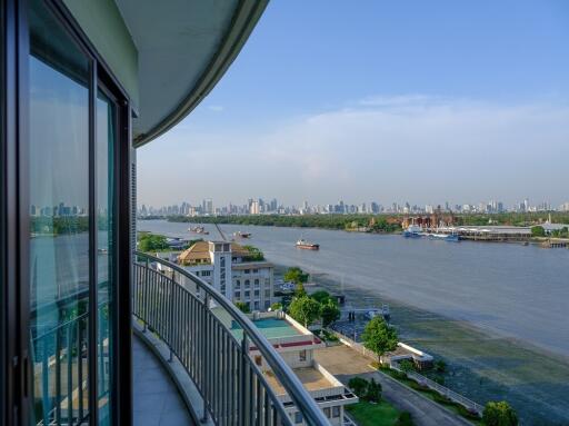 Balcony with river view and city skyline