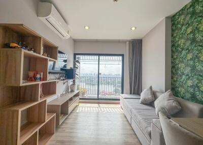 modern living room with natural light and balcony view