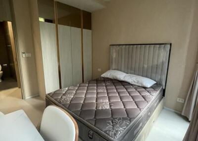 Modern bedroom with double bed and built-in wardrobes